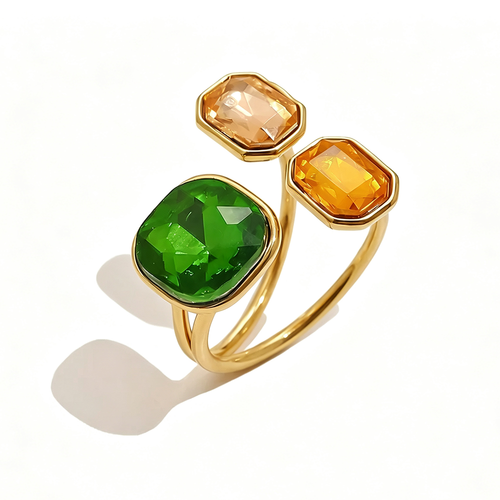 Gold triple stone open cocktail ring in Botanical colorway on white background, large deep green cushion stone with pale champagne and warm amber octagon stones in graduated bezel settings, open band with warm shadow
