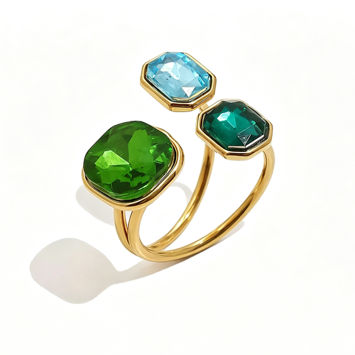 Gold triple stone open cocktail ring in Forest colorway on white background, large deep green cushion stone with ice blue and emerald green octagon stones in graduated bezel settings, open band with warm shadow

