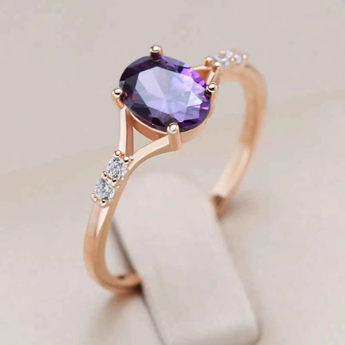 Oval Purple Zircon Solitaire with Side Accents