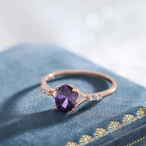 Oval Purple Zircon Solitaire with Side Accents