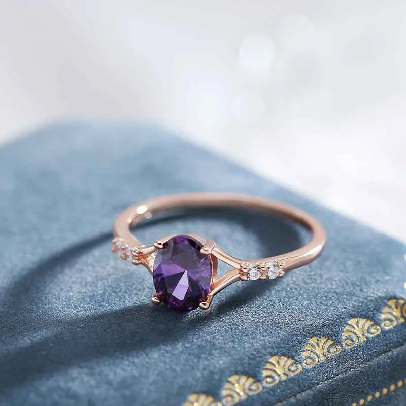 Oval Purple Zircon Solitaire with Side Accents