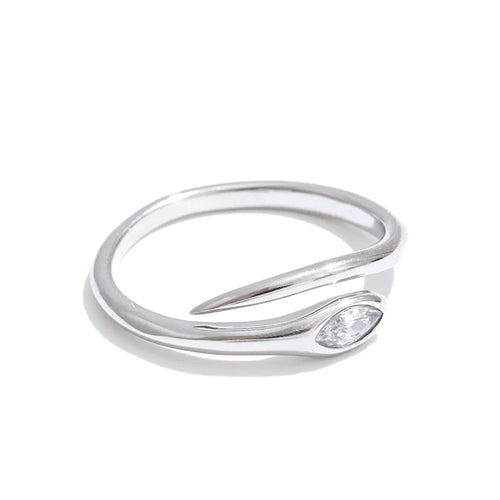 Silver marquise stone snake ring on white background, open adjustable band in three-quarter angle, bezel-set marquise-cut stone at snake head, tapered tail end and open gap visible, cool light with soft shadow
