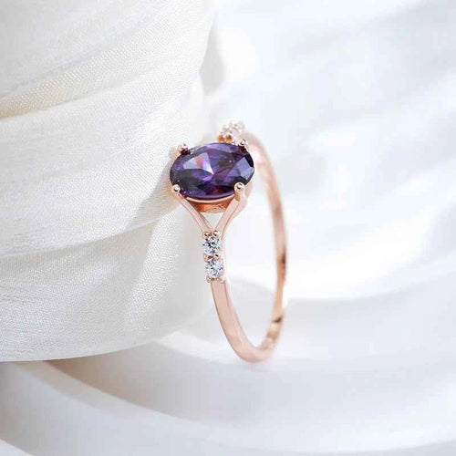 Oval Purple Zircon Solitaire with Side Accents
