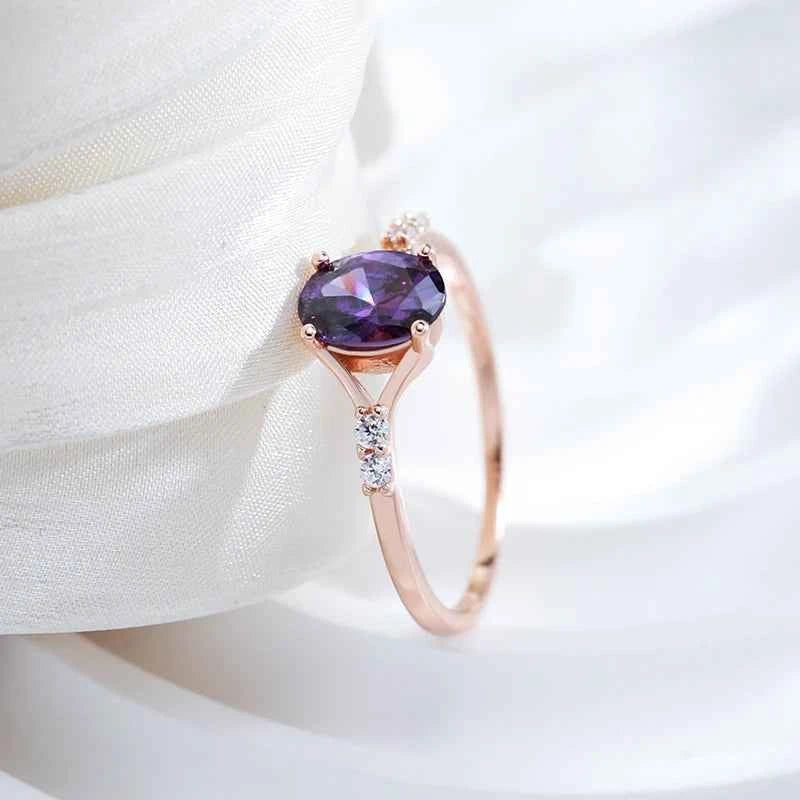 Oval Purple Zircon Solitaire with Side Accents