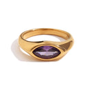 Gold marquise stone dome signet ring in purple colorway on white background, deep violet marquise-cut stone bezel-set in wide mirror-polished gold dome band, long warm directional shadow
